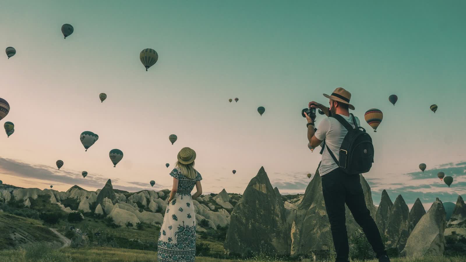 The Animated Photo Albums feature — a family beach photo living in motion, then playing inside a Sustain album